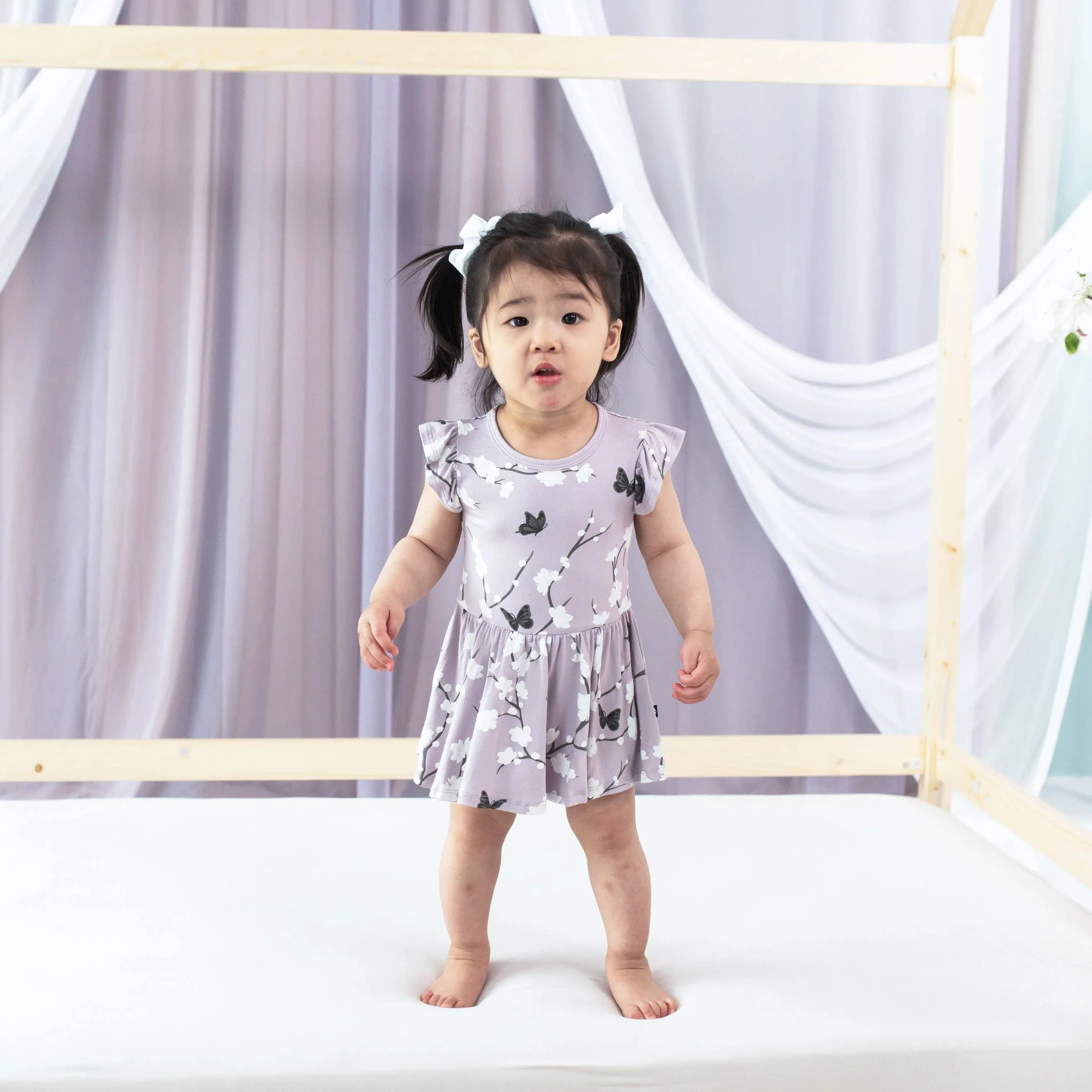 Kyte Baby Short Sleeve Twirl Bodysuit Dress - Cherry Blossom