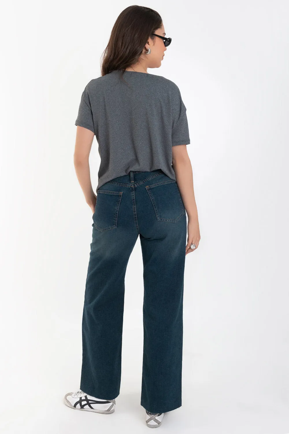 Pantalón de denim con rotos fit recto